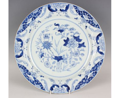 A Chinese blue and white export porcelain circular dish, Yongzheng period, the centre finely painted with bamboo, peony, chry