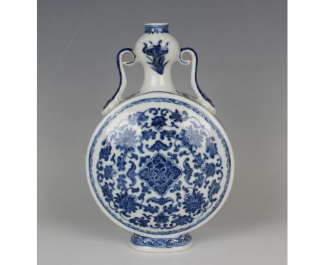 A Chinese Ming style blue and white porcelain moonflask, mark of Qianlong but later, the flattened circular body painted with