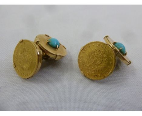 A pair of gold cufflinks each set with Five Mark gold coins and a cabochon turquoise, coins tested 22ct,  gold fittings teste