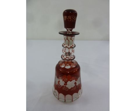 A late 19th century red flash bell shaped decanter with drop stopper