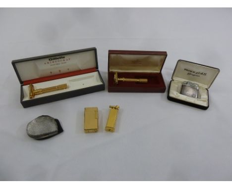 A quantity of mens accessories to include a Gillette gold plated razor, a Prince Prona lighter, a Maruman Fliptop lighter, a 