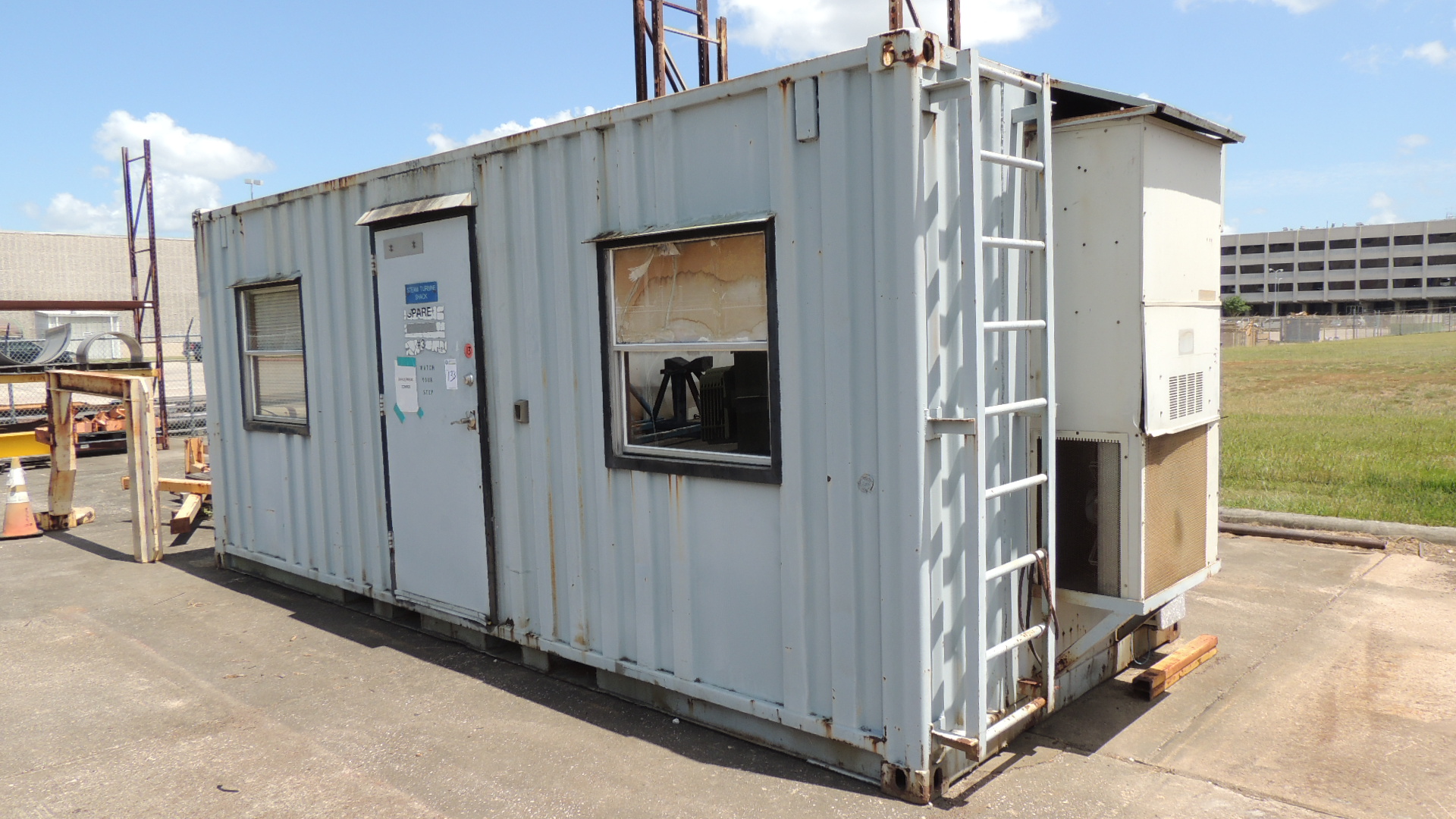 Container / Office. Conex 20' container and contents, side door two windows, A/C, desk, refrigera
