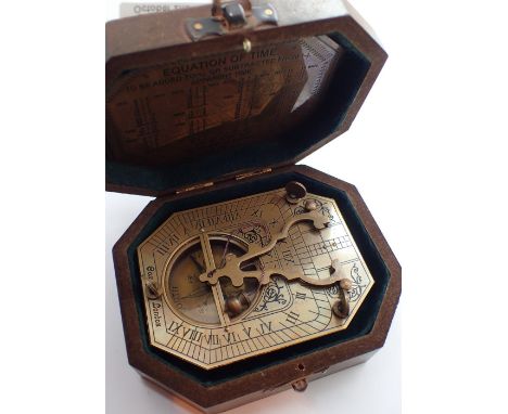 Boxed brass sundial compass marked Cox London