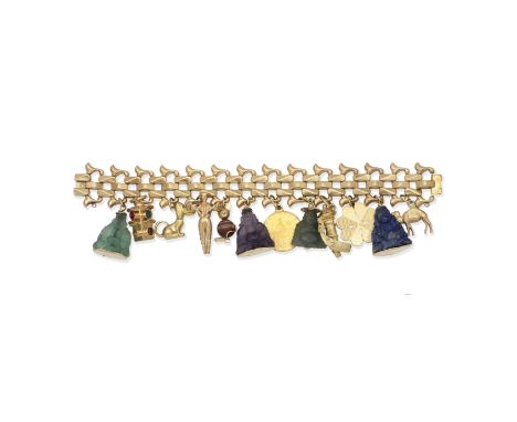Gem-set charm braceletThe fancy-link chain suspending various charms including carved lapis lazuli and amethyst Buddhas, a fo
