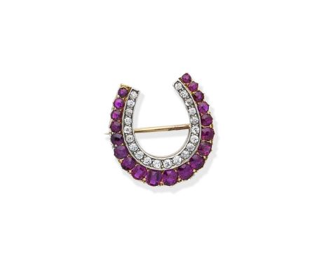 Ruby and diamond horseshoe brooch, circa 1900Set with circular-cut rubies and old brilliant-cut diamonds, mounted in silver a