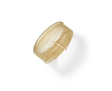 UnoAErre: A bangleDesigned as a sprung textured coil, signed UnoAErre, bangle inner diameter 6.5cmFor further information on 
