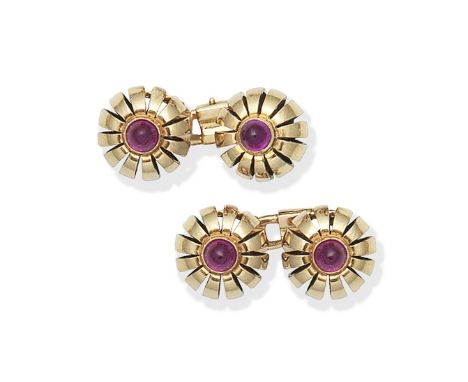 Ruby cufflinks, circa 1940Double-sided: Each openwork terminal accented by a circular ruby cabochon, maker's mark MA, French 