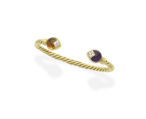 Bulgari: Gem-set torc bangleOf ropetwist design with cabochon amethyst and citrine terminals, accented by brilliant-cut diamo