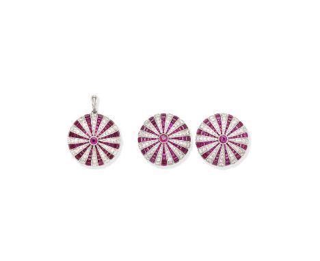 Ruby and diamond pendant and earring suiteThe circular-cut ruby issuing radiating courses of calibré-cut rubies, brilliant an