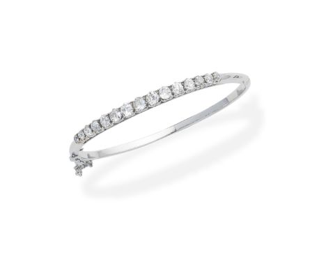 Diamond bangleThe hinged bangle set to the front with a graduated row of old brilliant-cut diamonds, diamonds approx. 2.50cts