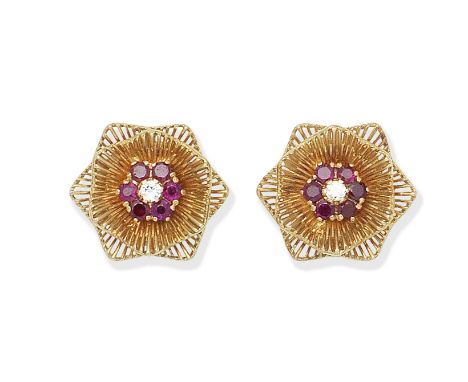 Sannit and Stein: pair of ruby and diamond earclips, 1958Each tiered flowerhead accented by a circular-cut ruby and brilliant