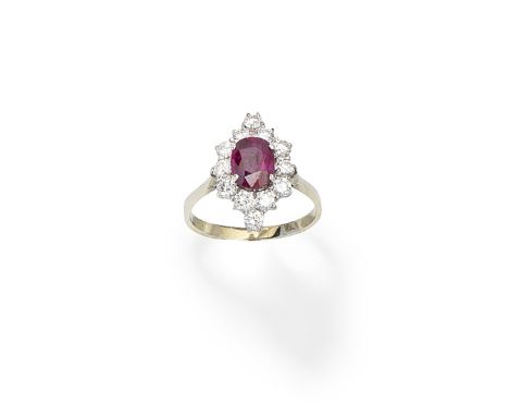 Ruby and diamond cluster ringThe oval-cut ruby within a surround of brilliant-cut diamonds,  ring size approx. QFootnotes:Acc