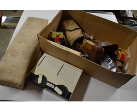 A box containing a Koroll camera; and various sundries 