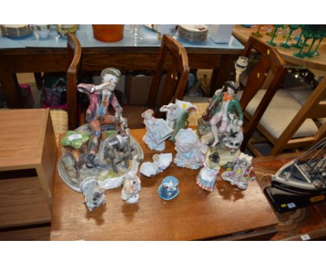 A Capo Di Monte figure; together with a Staffordshire style figural table lamp; and various other ornaments 