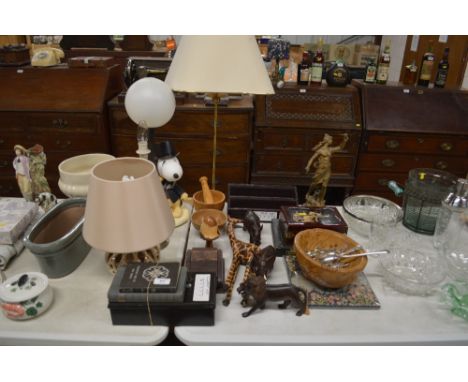 A table lamp in the form of Snoopy together with carved animal ornaments; a pottery table lamp base; turned wooden bowl; Spel