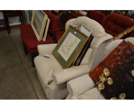 A button back reclining armchair