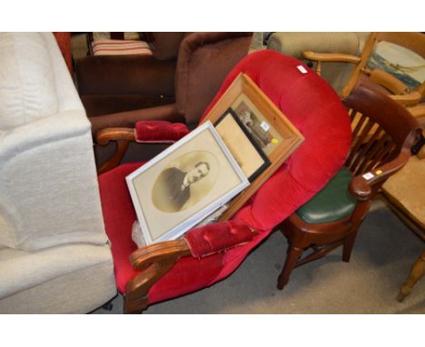A Victorian mahogany button back armchair