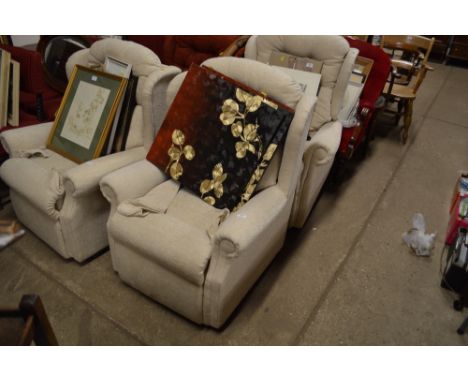A button back reclining armchair