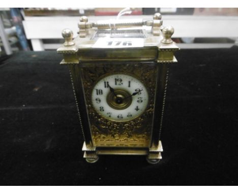 CONTINENTAL CARRIAGE CLOCK WITH ORNATE ORMOLU FACE A.F