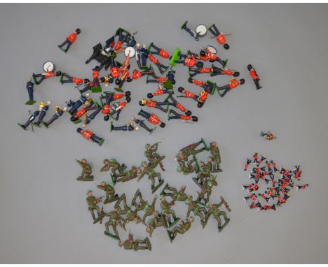 Approx. 70 x plastic toy soldiers by Britains and Crescent, F-VG. Together with a number of 1:72 scale figures.