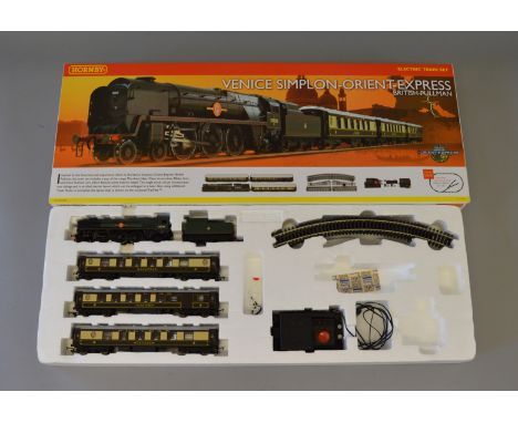 OO Gauge. Hornby R 1087 Venice Simplon - Orient Express train set. Incomplete. Loco, coaches & some track present. Overall G