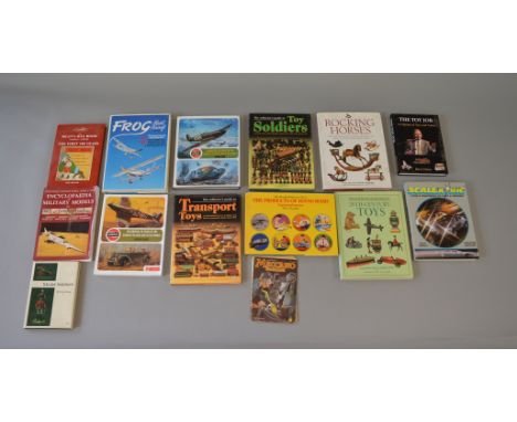 Collection of assorted vintage toy guide books.