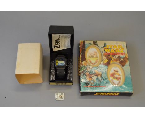 Two vintage Star Wars items: Zeon/Bradley Quartz digital watch featuring C-3PO and R2-D2, boxed with instructions, guarantee 