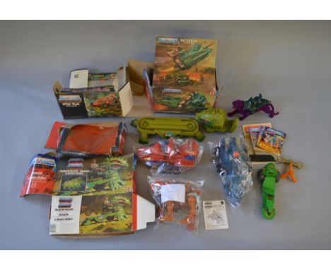 Mattel Masters of the Universe vehicles and toys: Battle Ram with F box; Dragon Walker with P box; Attak Trak with P box; Pan