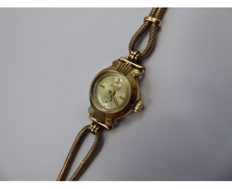 A Lady's 9ct Gold Acurist Wrist Watch, having baton numerals, on a 9ct gold bracelet (clasp broken) approx 8.2 gms.