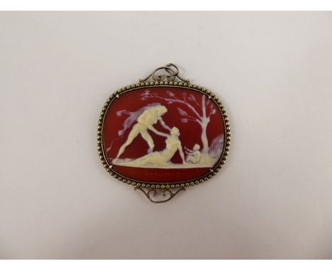 An Antique Sardonyx Cameo Pendant, carved with Hercules wearing the Nemean Lion Skin, contained within a silver mount, engrav
