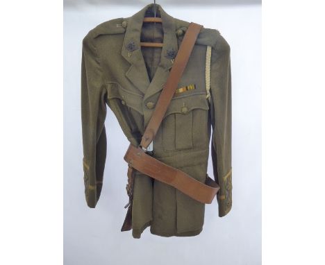 A WWI Army Uniform Jacket, Worcester Regiment, size medium, complete with leather belt.