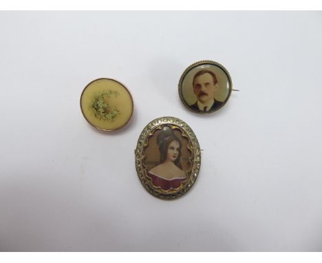 Three Portrait Miniatures, including a photographic brooch stamped 22k, floral pin brooch, miniature of a Victorian lady and 