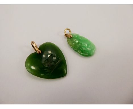 An Apple Green Jade Carved Pendant on 14 ct yellow gold mount , the pendant carvewd with fruit  together with a jade heart sh