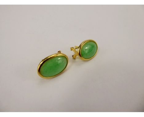 A Pair of 18 ct Yellow Gold Green Jade Earrings, approx 15 x 10 mm, approx wt. 4.7 gms.