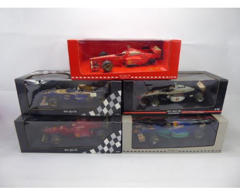 A Quantity of 1:18 Scale Die Cast Formula I Cars, including Ferrari (Irvine), Ford, McLaren, Renault (Jacques Villeneuve), Re