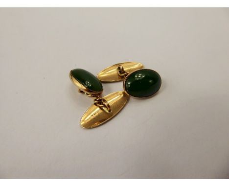A Pair of Gentleman's 9 ct Yellow Gold and Bright Green Jade Cuff  Links, approx wt. 5.5 gms.