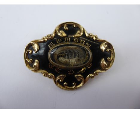 A 14ct Black Enamel Mourning Brooch Pendant, the brooch engraved Daniel Bayliss died July 28th 1861, approx 24 gms.