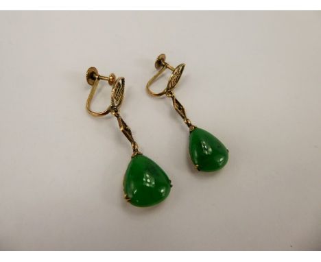 A Pair of Chinese 14 ct Yellow Gold Bright Green Jade Earrings, the earrings having character marks to mount, approx 10 x 8 m