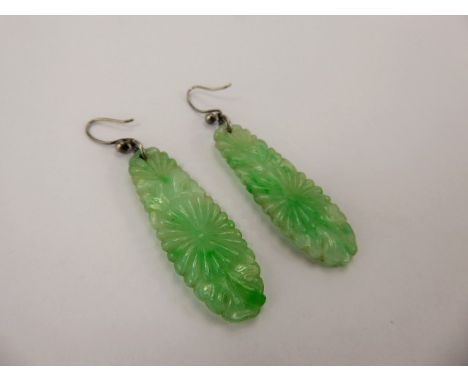 A Pair of Chinese Green and White Jade Carved Floral Earrings with silver mounts, approx 42 x 10 mm, approx wt. 7.6 gms.