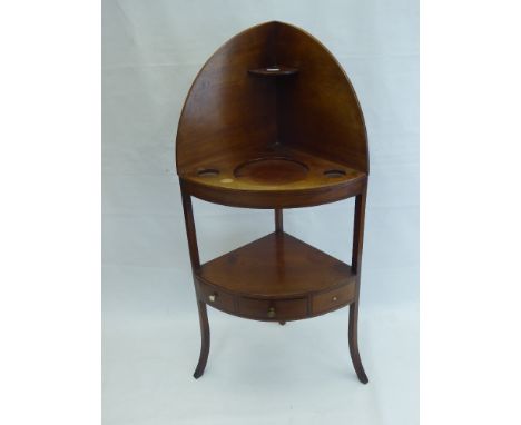 A Victorian Mahogany Corner Wash Stand, with shelf beneath and two vanity drawers with ivory knops.