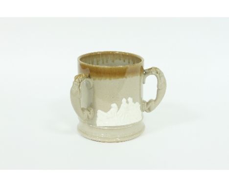 A stoneware tyg of large size, with three greyhound handles and raised decoration of rural scenes, 19cm high Condition Report