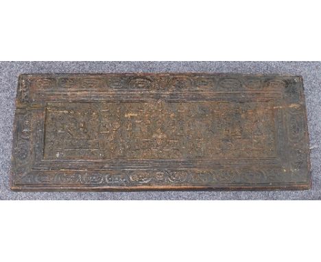 A carved Indian panel, 29.5cm x 72.5cm Condition Report: PANEL THERE IS A CRACK RUNNING THROUGH THIS PANEL WHICH IS NOW DELIC