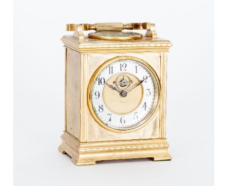 A late 19th Century brass eight-day mantel clock, by Hobday and Co, Birmingham, the case with swing handle and compass and th