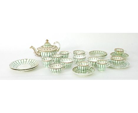 A Victorian part tea service painted green trelliswork and with stylised foliage borders, twenty pieces and a similar two-han