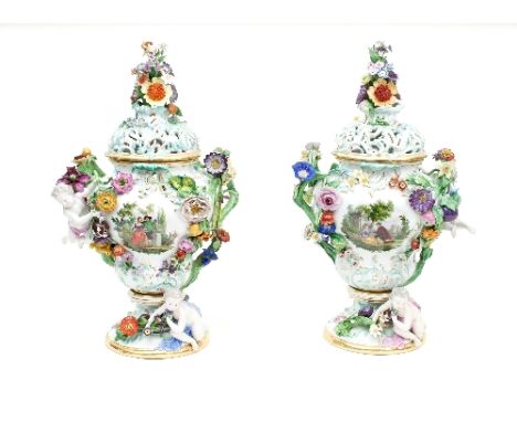 A pair of Meissen flower-encrusted pot pourri vase and covers, incised 2745/50, of ogee form with stalk handles issuing flowe