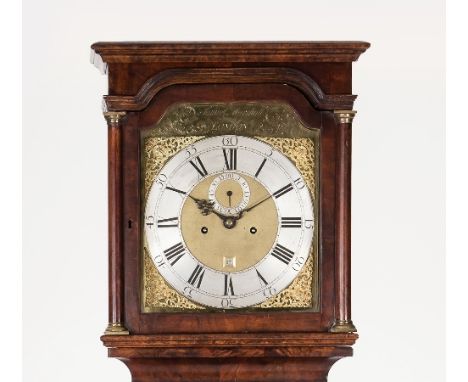 A mid 18th Century walnut eight-day longcase clock, by Samuel Marshall, London, the hood with turned columns to the sides, th