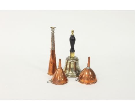 A brass bell, 27cm high, a copper hunting horn and two copper funnels