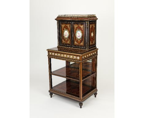 A 19th Century amboyna and ebony cabinet, with three quarter balustrade gallery above two panelled doors set with Paris porce