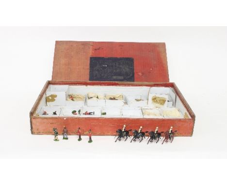 A quantity of Britains soldiers, including guardsmen, cavalrymen, bandsmen etc. in a box 'Types of the British Army', No. 73