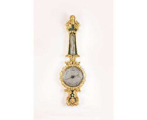 A fine two-piece wheel barometer, Bregazzi and Co, in plaster gilt case molded with floral scrolls and face masks, 114cm high